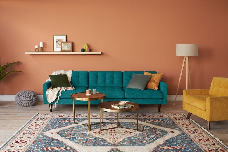 Joybird Eliot Grand Sofa teal with terra cotta wall