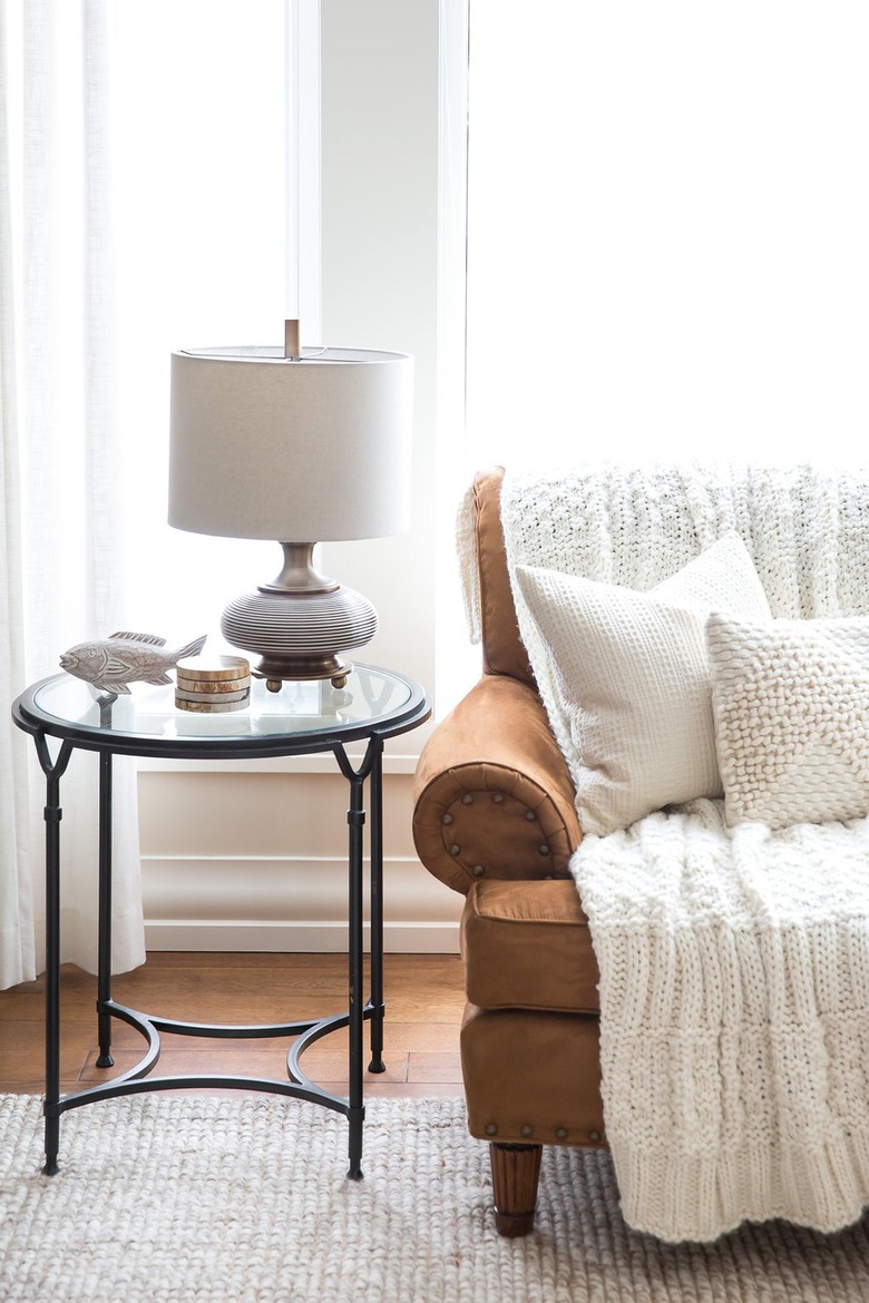 cream living room with cognac sofa