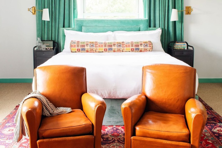 orange and mint color scheme in bedroom