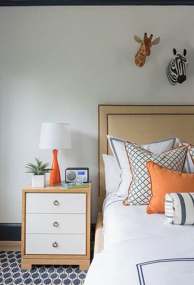 boys room with orange accents