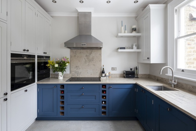 natural limestone with blue cabinets