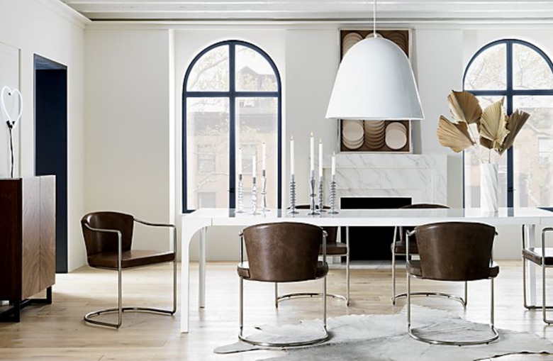 White aluminum contemporary dining room lighting above table
