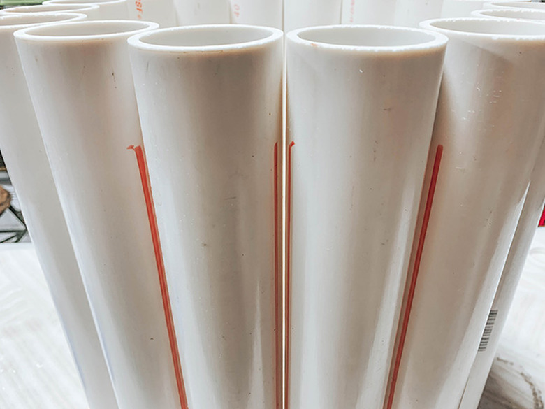 Use a thick felt tip marker to add guide lines in between the pipes so you can line them up easier in the next step.