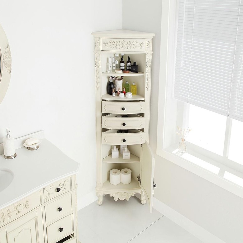 Single Door corner bathroom cabinet in Antique White in white bathroom