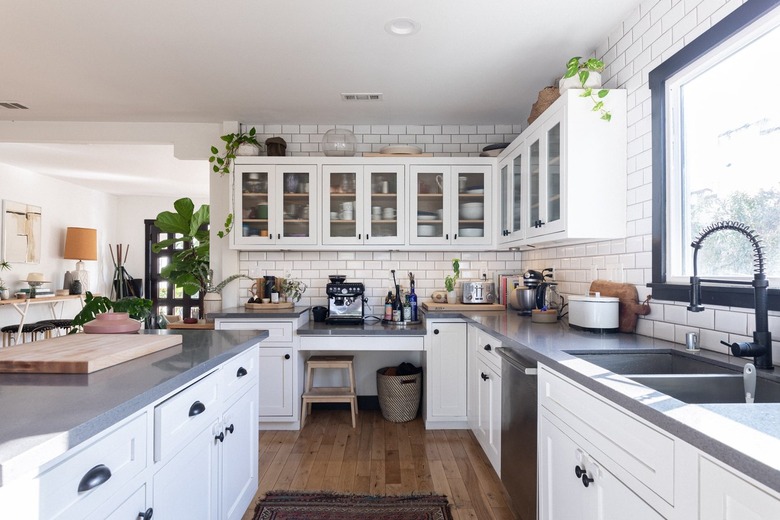 Kitchen with white cabinets and gray countertops