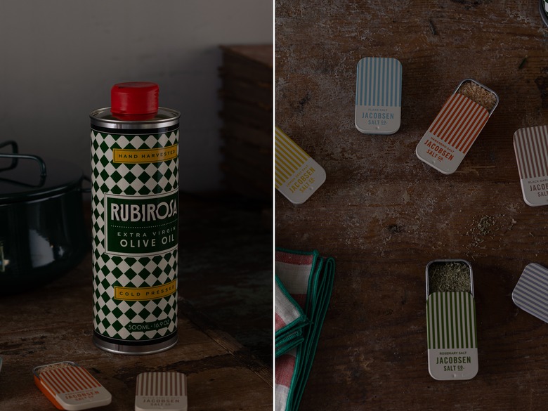 fancy olive oil next to tins of flavored salt