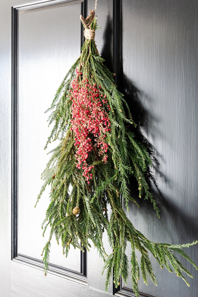 christmas door swag with red berries