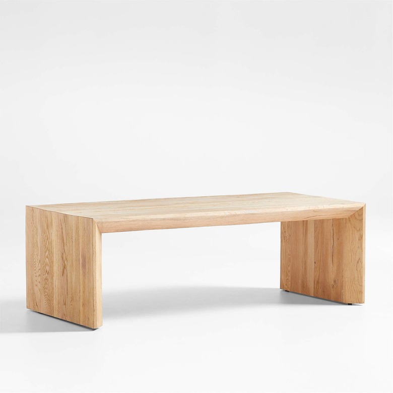 low sled coffee table in light wood