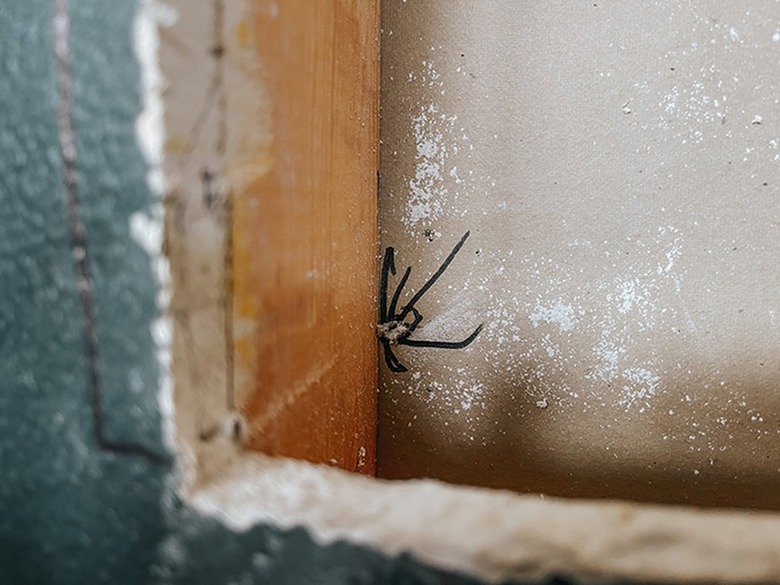 Drill holes through the corners you marked.