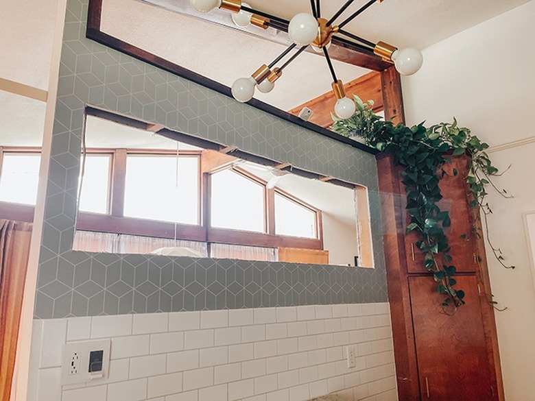 Saw through the studs to completely remove them.