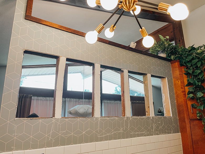 Cut out the second side of your cutout between the studs.