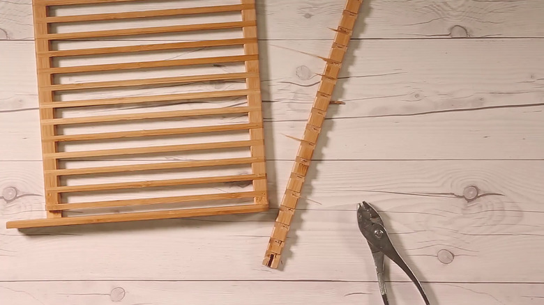 Center support beam pried off rack