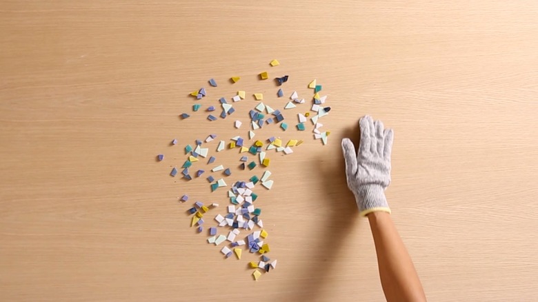 Cutting glass tiles and mosaic smalti for terrazzo table