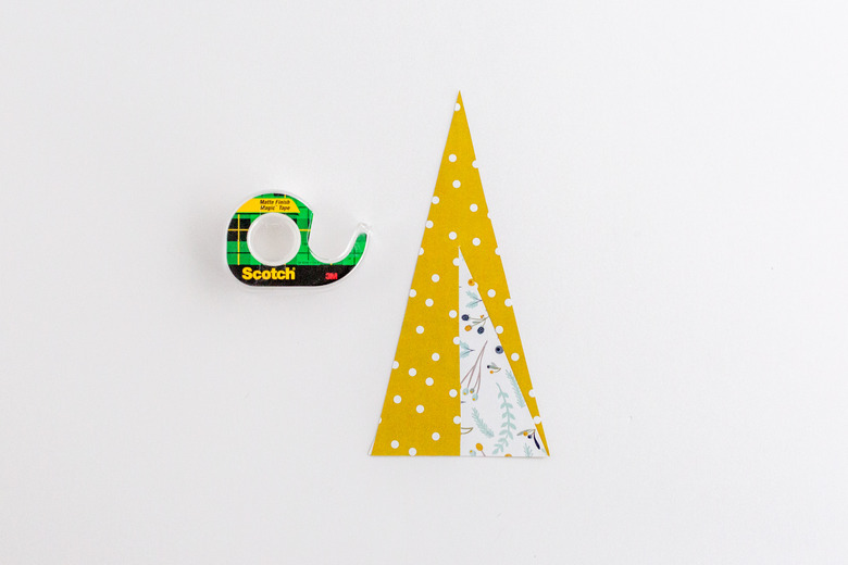 Slip the two paper shapes together and tape.