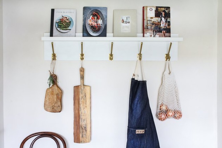 Wall shelf with hooks