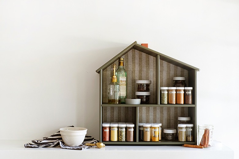IKEA hack: Turn a dollhouse into a spice rack for your kitchen.