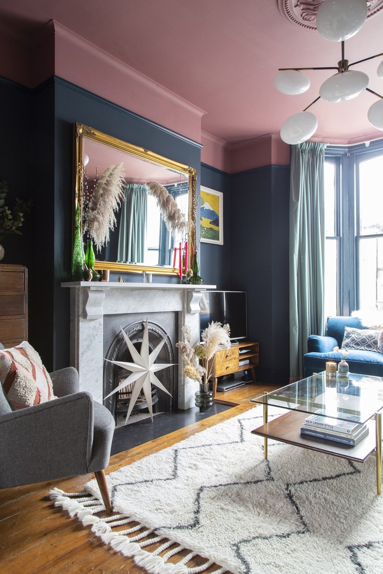 navy blue walls with pink ceiling and aqua curtains