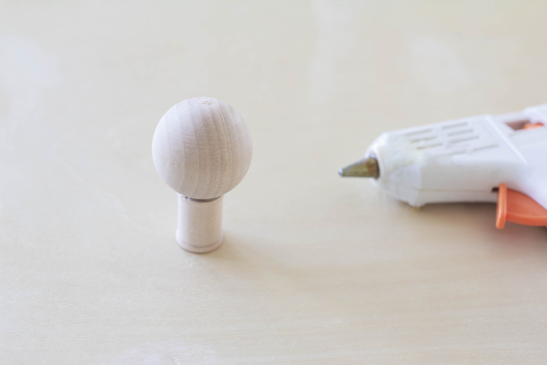 Gluing wood bead on top of wood spool