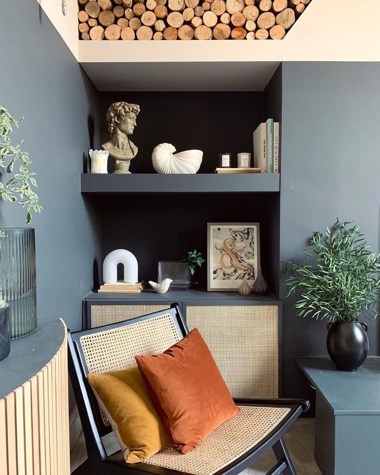 blue gray living room with rattan details