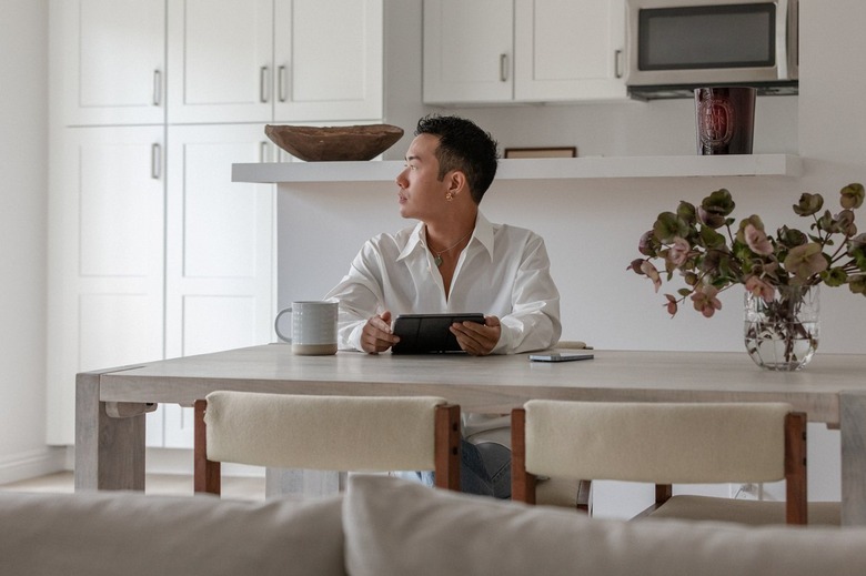 David Samuel Ko sitting at dining table