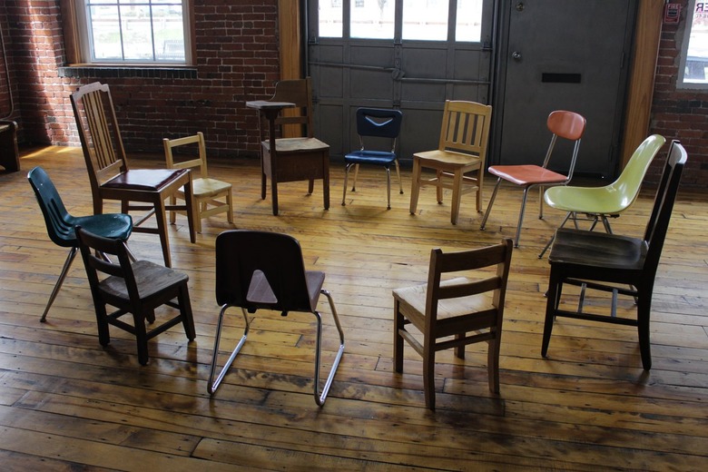 A circle of schoolroom chairs