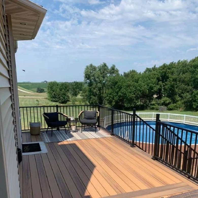above ground pool with landing deck