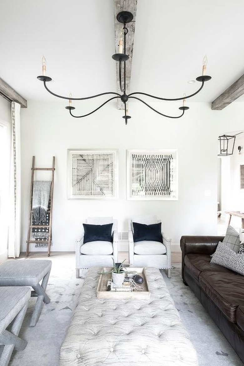 brown leather sofa in white room