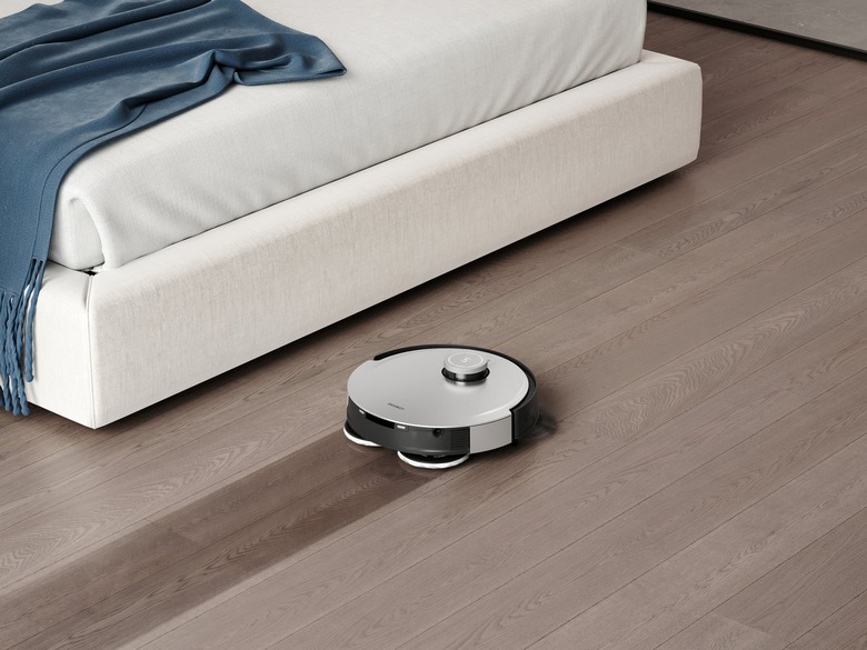 Ecovacs Deebot X1 Omni on floor with dust