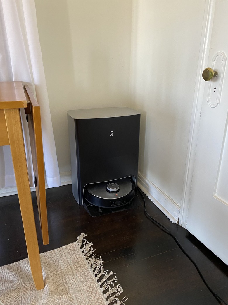 Deebot X1 Omni station and vacuum in room