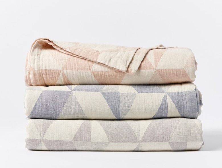 stacked geometric pastel blankets