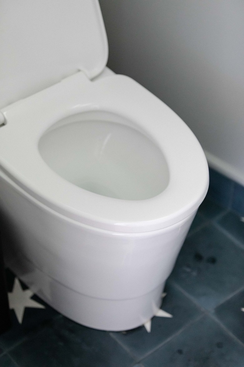 open toilet seat on modern toilet