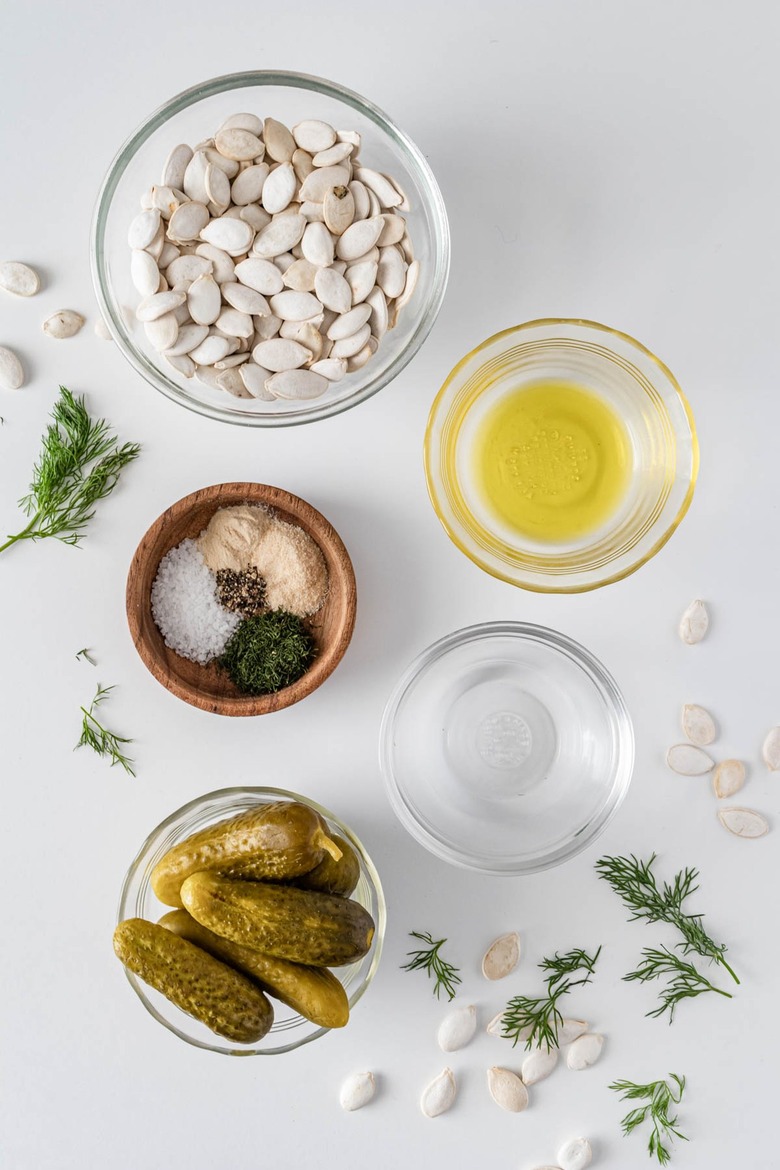 Small bowls of pumpkin seeds