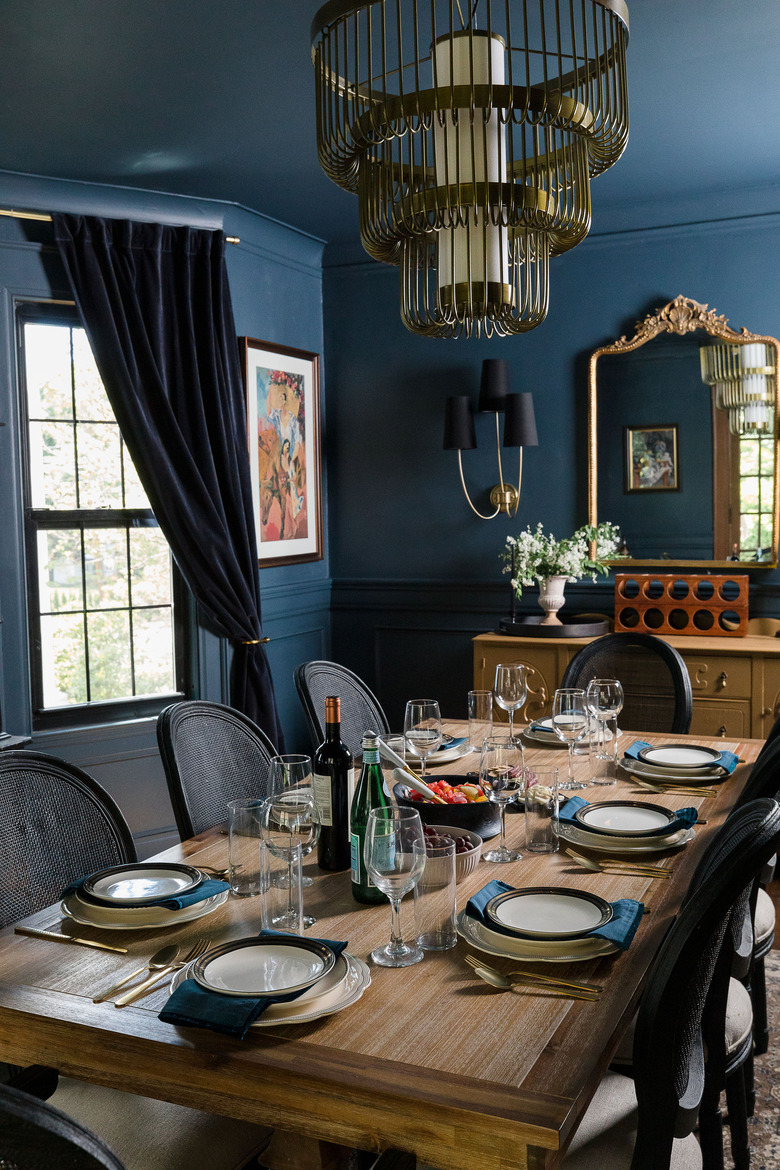 velvet dark blue curtains in dark blue dining room
