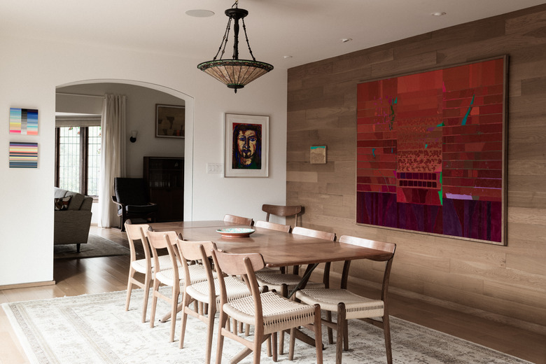 Dining room dining room lighting idea with art on wall