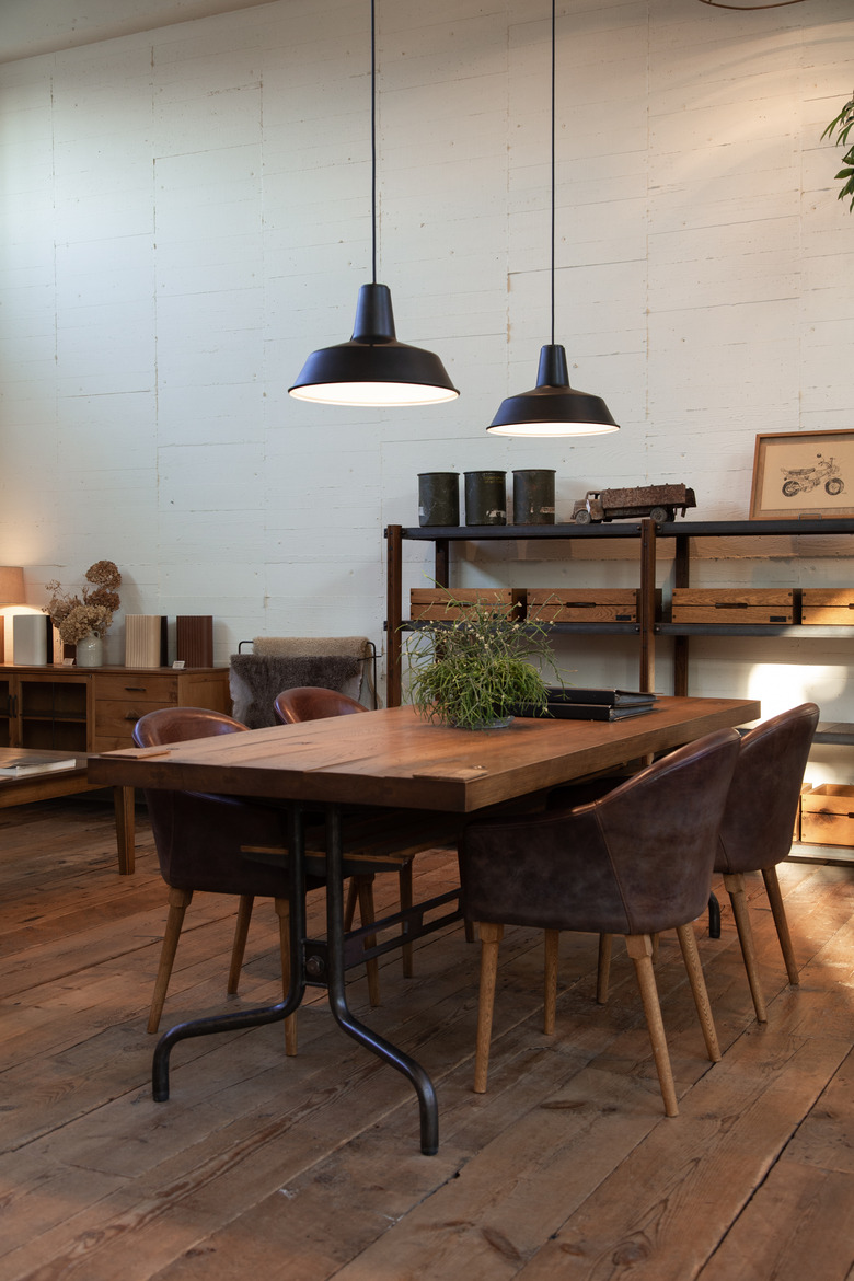 Industrial dining room lighting idea with metal factory pendants