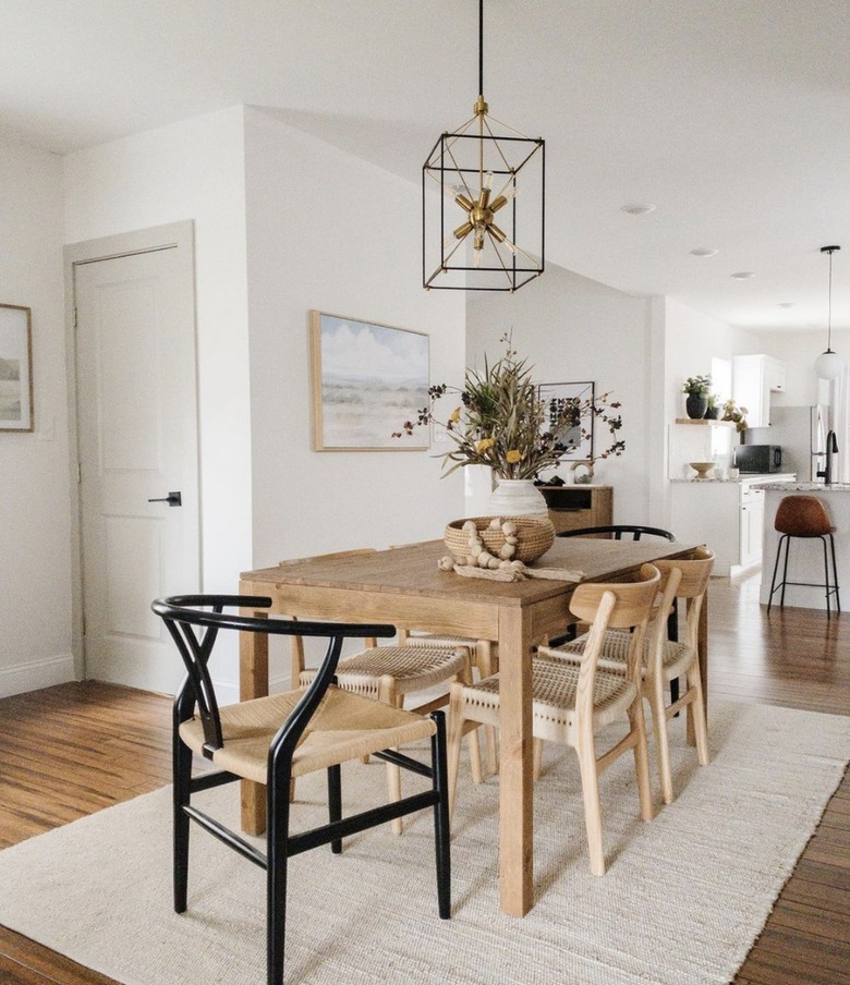 Boho dining room table with wooden beads in a bowl.