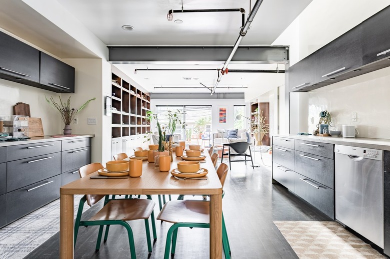 Contemporary kitchen with black cabinets