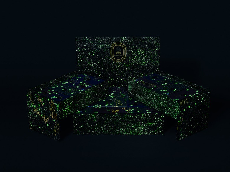 Diptyque's advent calendar glowing in the dark.