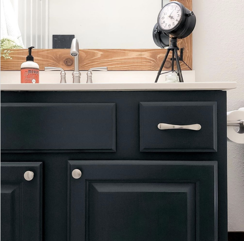 DIY bathroom vanity repainted dark blue-gray