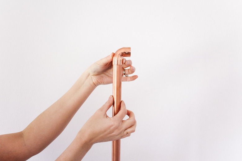 fitting an elbow joint on a long section of pipe