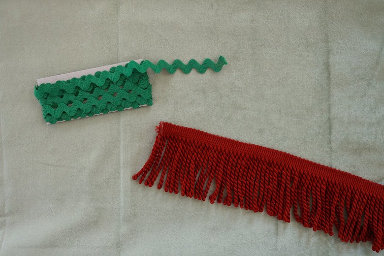 Emerald green rick rack trim and brick red bullion fringe trim