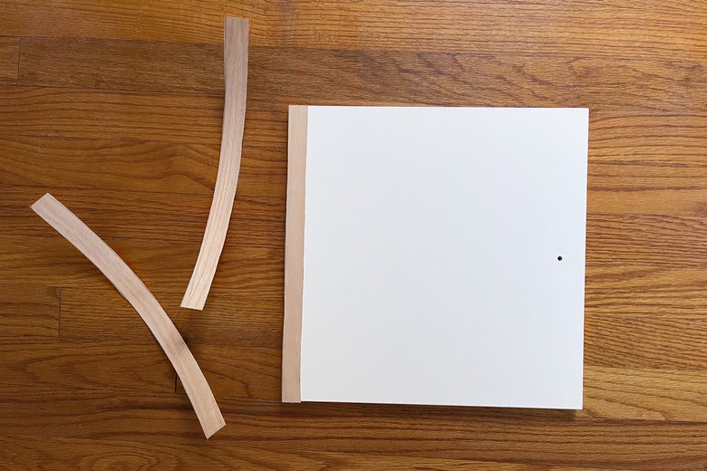 Strip of wood veneer attached to outer edge of IKEA Kallax door