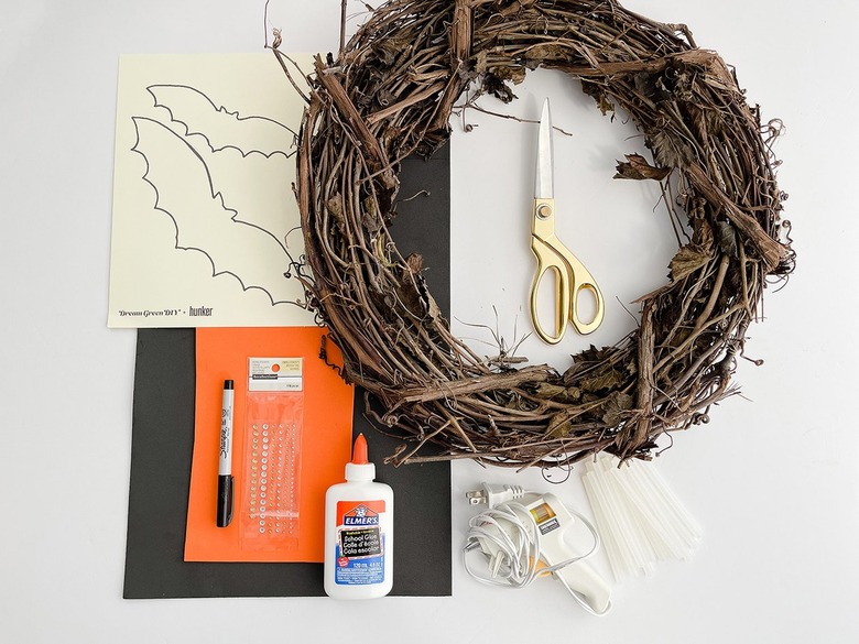 Here's what you'll need to make your DIY Halloween Bat Wreath.