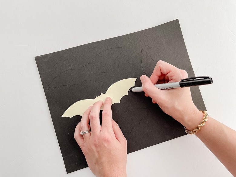 Trace the bat template onto black foam.