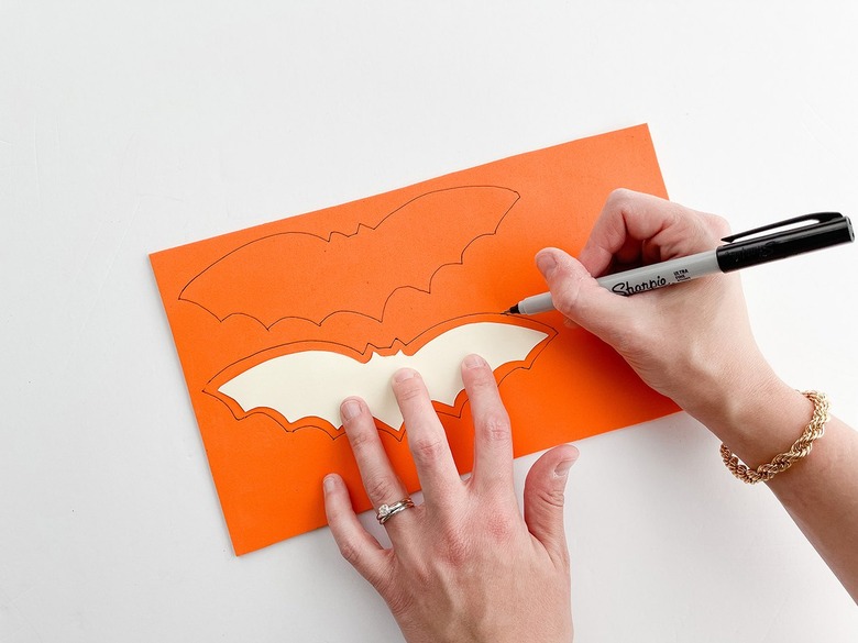 Trace the bat template onto orange foam.