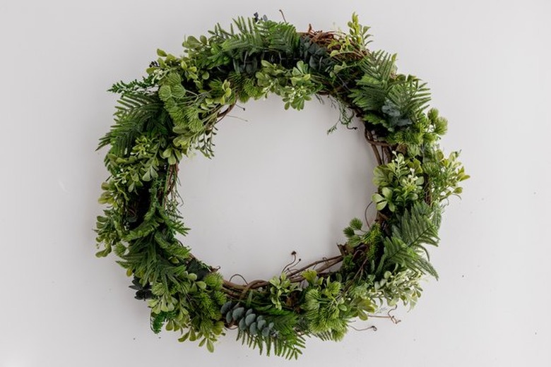 Faux evergreen wreath.