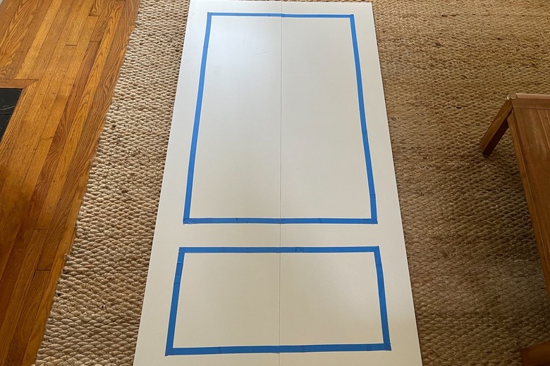 Molding design taped with blue painter's tape on IKEA FORSAND doors