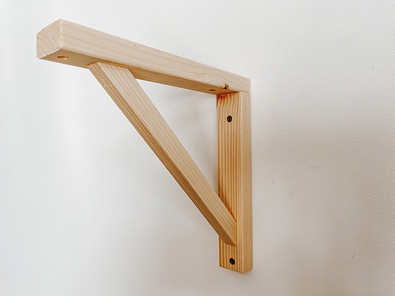 Install the bracket onto the wall.