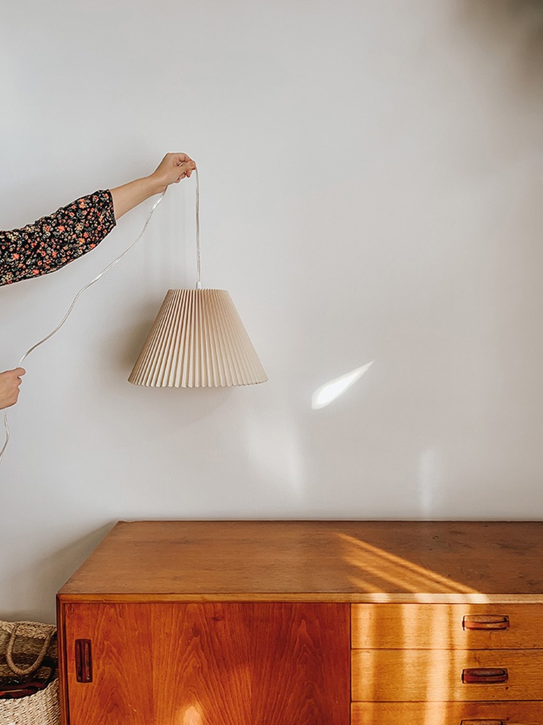 Decide where you want to hang your pleated shade pendant.