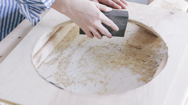 Sanding the round hole cut out of front piece